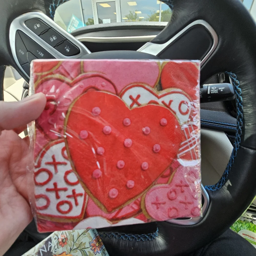 15 packs of various size napkins and themes
